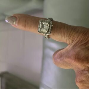 Elegant Silver-Toned Ring With Large Square Stone